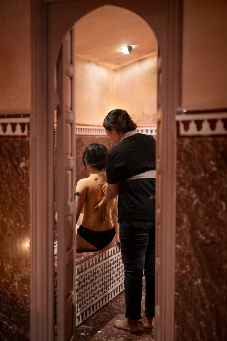 Professional back massage treatment at Les Bains Almaha luxury spa Marrakech